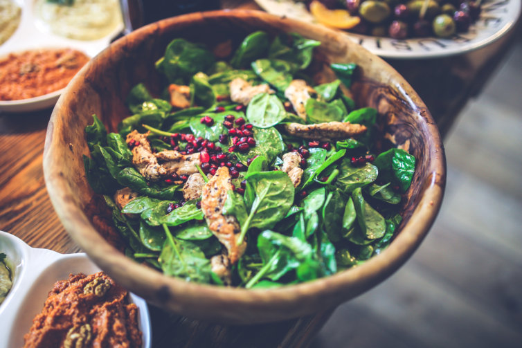 Spinach and pomegranate Caesar salad